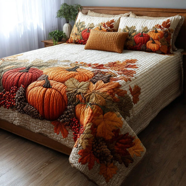 Pinecone Harvest quilted 3-piece bedding set on a made bed with two matching pillow shams