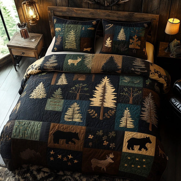 Pinecone Tracks quilted 3-piece bedding set on a made bed with two matching pillow shams
