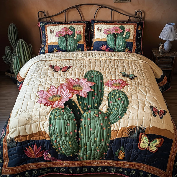 Pink Desert Flower quilted 3-piece bedding set on a made bed with two matching pillow shams