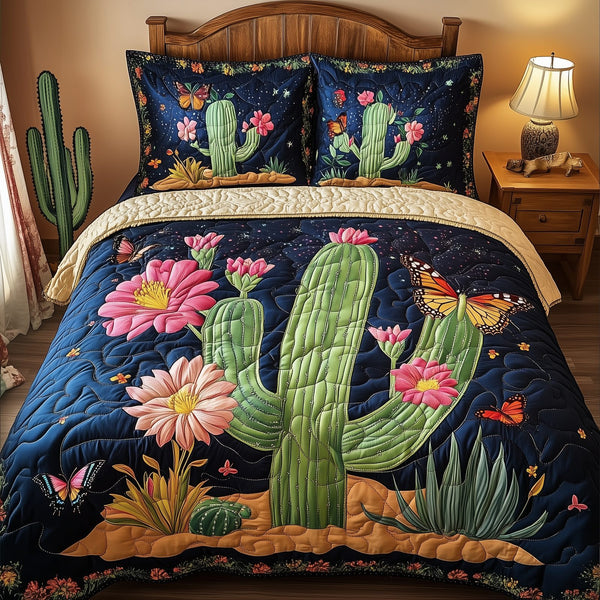 Pink Desert Flower quilted 3-piece bedding set on a made bed with two matching pillow shams