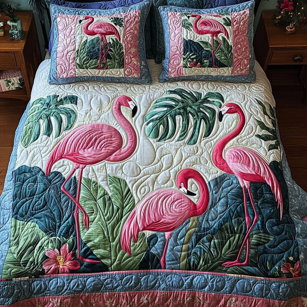 Pink Euphoria quilted 3-piece bedding set on a made bed with two matching pillow shams