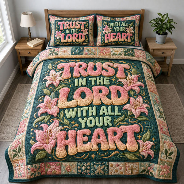 Pink Lily Christian Trust In The Lord quilted 3-piece bedding set on a made bed in a softly lit bedroom