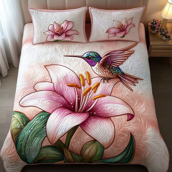Pink Lily Flight quilted 3-piece bedding set on a made bed with two matching pillow shams