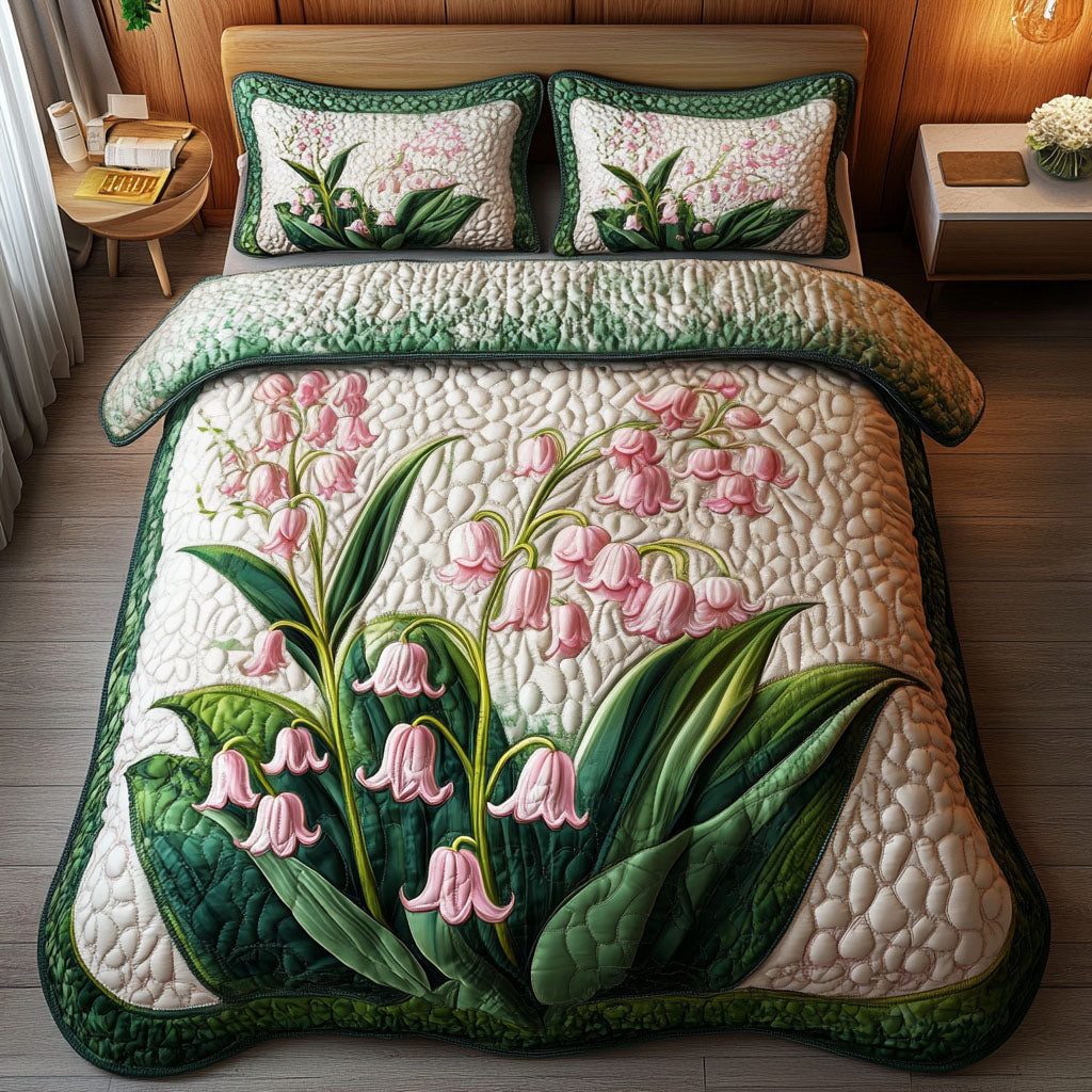 Pink Lily Garden quilted 3-piece bedding set on a made bed with two matching pillow shams