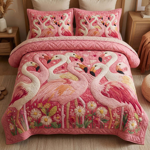 Pink Parade quilted 3-piece bedding set on a made bed with two matching pillow shams