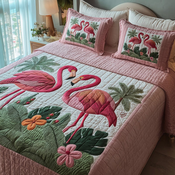 Pink Paradise quilted 3-piece bedding set on a made bed with two matching pillow shams