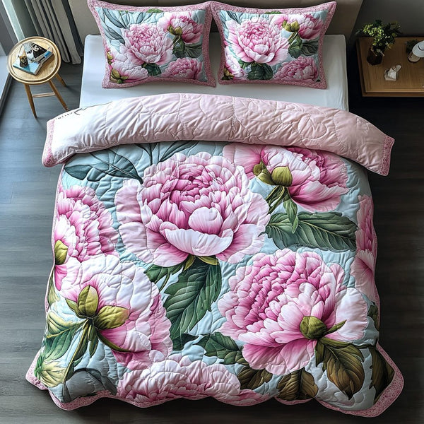 Pink Serenity quilted 3-piece bedding set on a made bed with two matching pillow shams