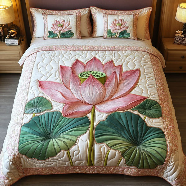 Pink Serenity quilted 3-piece bedding set on a made bed with two matching pillow shams