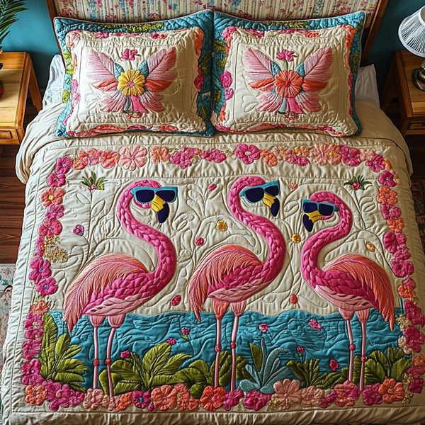 Pinky Flamingo quilted 3-piece bedding set on a made bed with two matching pillow shams