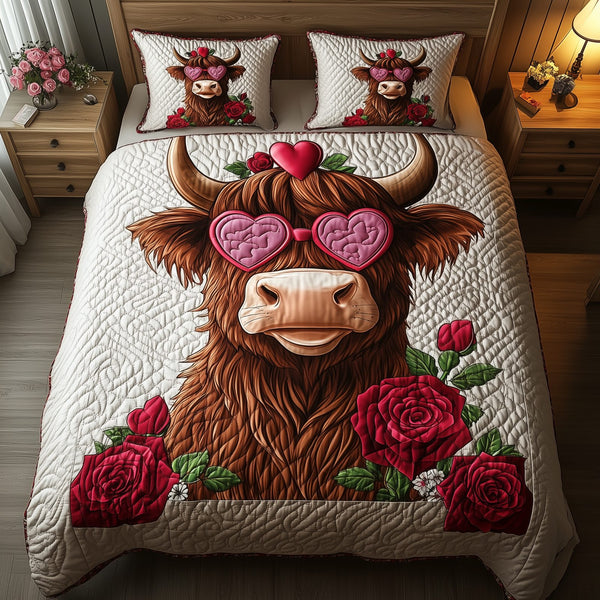 Pinky Highland Cow quilted 3-piece bedding set on a made bed with two matching pillow shams