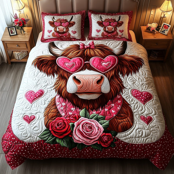 Pinky Highland Cow quilted 3-piece bedding set on a made bed with two matching pillow shams