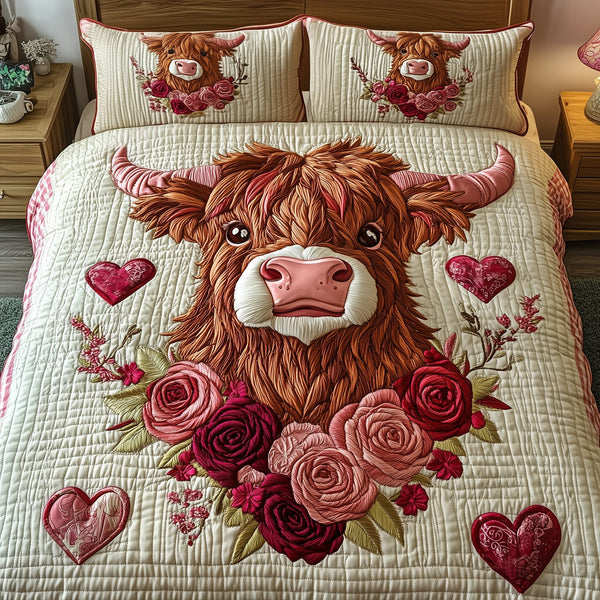 Pinky Sweetie Highland Cow quilted 3-piece bedding set on a made bed with two matching pillow shams