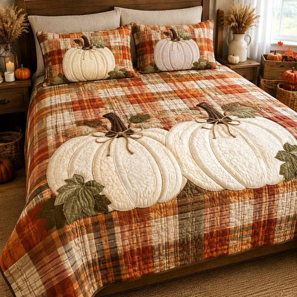 Plaid Pumpkin quilted 3-piece bedding set on a made bed against a dark styled interior