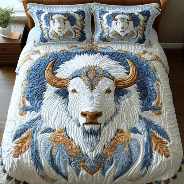 Plains Wanderer quilted 3-piece bedding set on a made bed with two matching pillow shams
