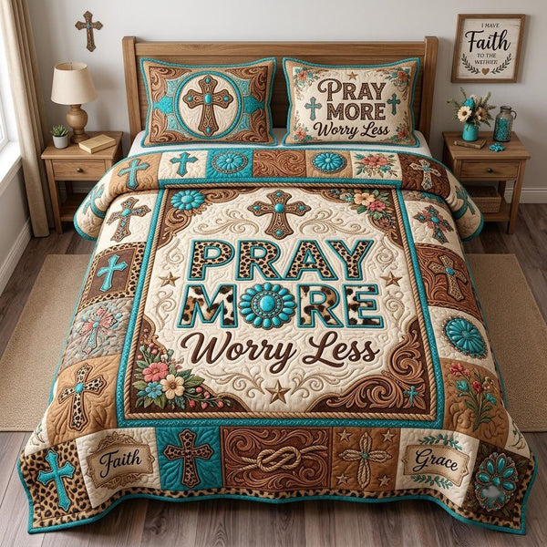 Play More Worry Less quilted 3-piece bedding set on a made bed with two matching pillow shams