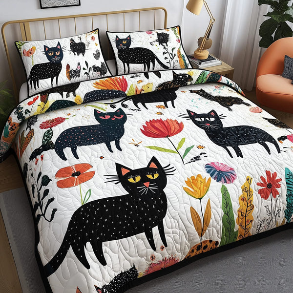 Playful Botanical Cat quilted 3-piece bedding set on a made bed with two matching pillow shams