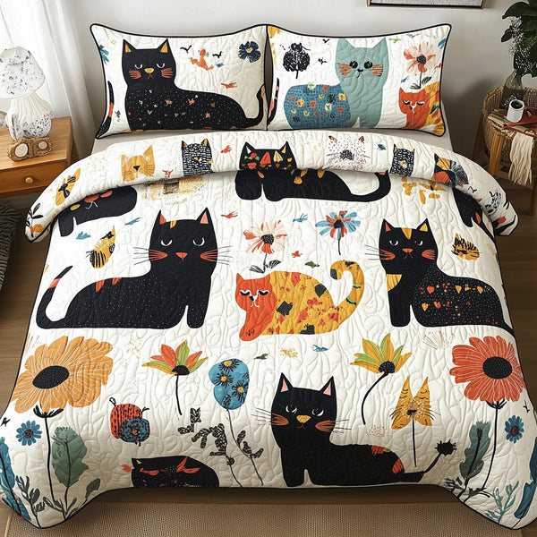 Playful Botanical Cat quilted 3-piece bedding set on a made bed with two matching pillow shams