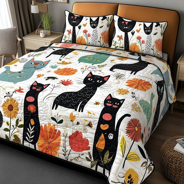 Playful Botanical Cat quilted 3-piece bedding set on a made bed with two matching pillow shams