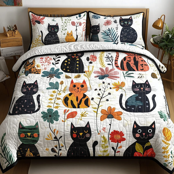 Playful Botanical Cat quilted 3-piece bedding set on a made bed with two matching pillow shams