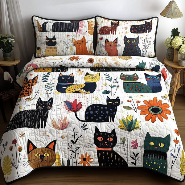 Playful Botanical Cat quilted 3-piece bedding set on a made bed with two matching pillow shams