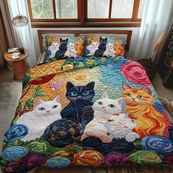 Playful Cats And Yarn quilted 3-piece bedding set on a made bed with two matching pillow shams