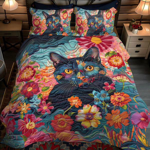 Playful Floral Cats quilted 3-piece bedding set on a made bed with two matching pillow shams