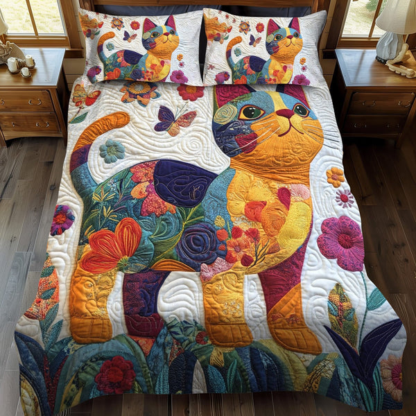 Playful Floral Cats quilted 3-piece bedding set on a made bed with two matching pillow shams