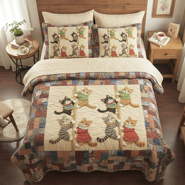 Playful Kittens quilted 3-piece bedding set on a made bed with two matching pillow shams