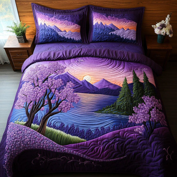 Plum Grove quilted 3-piece bedding set on a made bed with two matching pillow shams