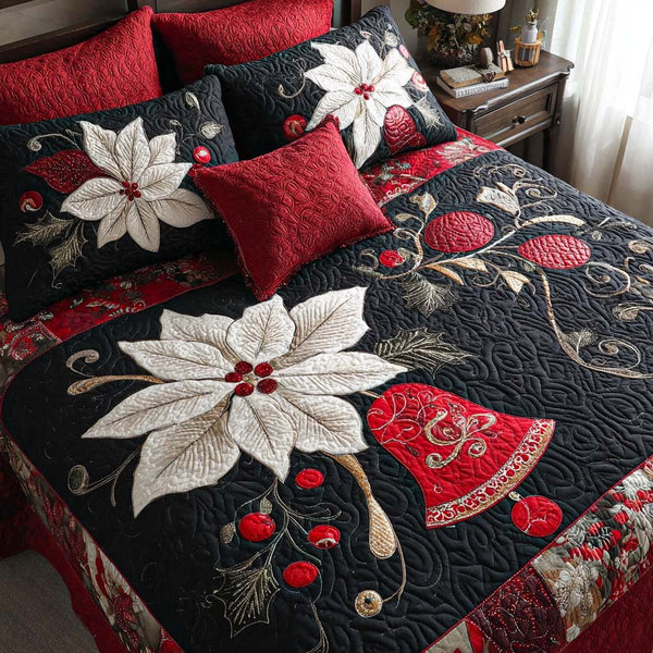 Poinsettia Bells quilted 3-piece bedding set on a made bed in a winter-styled bedroom