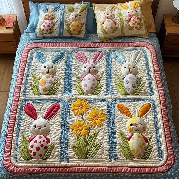 Polka Dot Bunny Joy quilted 3-piece bedding set on a made bed with two matching pillow shams