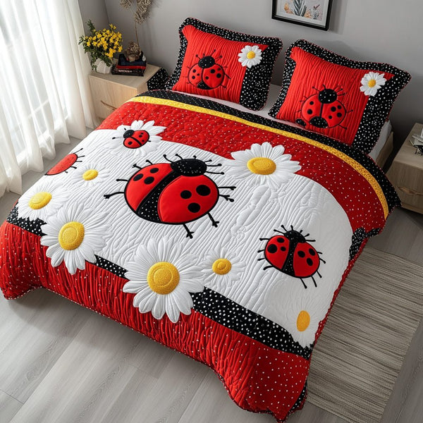 Polka Dot Charm quilted 3-piece bedding set on a made bed with two matching pillow shams