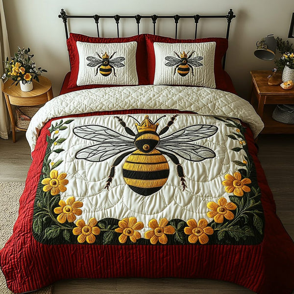 Pollinator Paradise quilted 3-piece bedding set on a made bed with two matching pillow shams