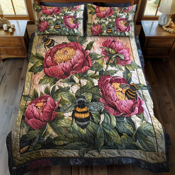 Pollinator's Floral Haven quilted 3-piece bedding set on a made bed with two matching pillow shams