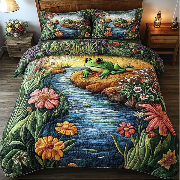 Pond Serenade quilted 3-piece bedding set on a made bed with two matching pillow shams