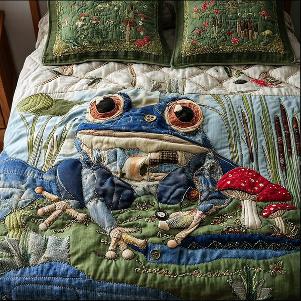 Pond Whispers quilted 3-piece bedding set on a made bed with two matching pillow shams