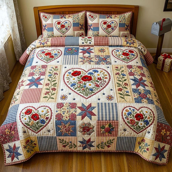 Poppy Bloom quilted 3-piece bedding set on a made bed with two matching pillow shams
