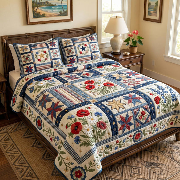 Poppy Bloom quilted 3-piece bedding set on a made bed with two matching pillow shams