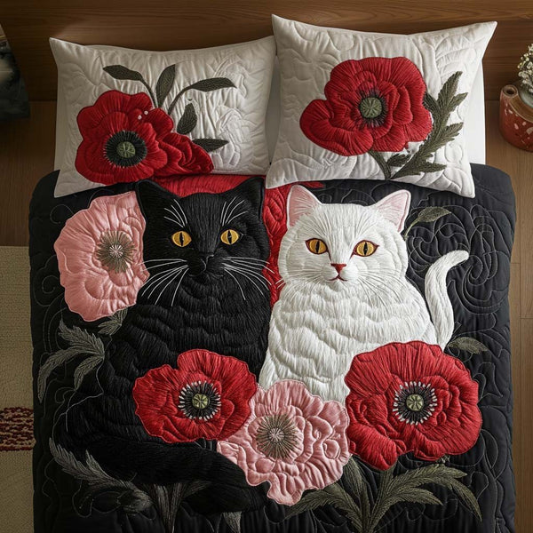 Poppy Companions quilted 3-piece bedding set on a made bed with two matching pillow shams