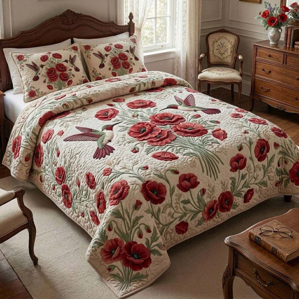 Poppy Humming quilted 3-piece bedding set on a made bed with two matching pillow shams