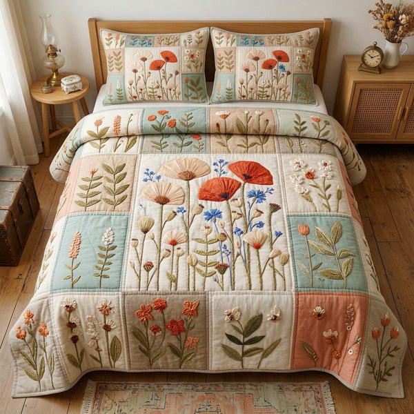 Poppy Meadow quilted 3-piece bedding set on a made bed with two matching pillow shams
