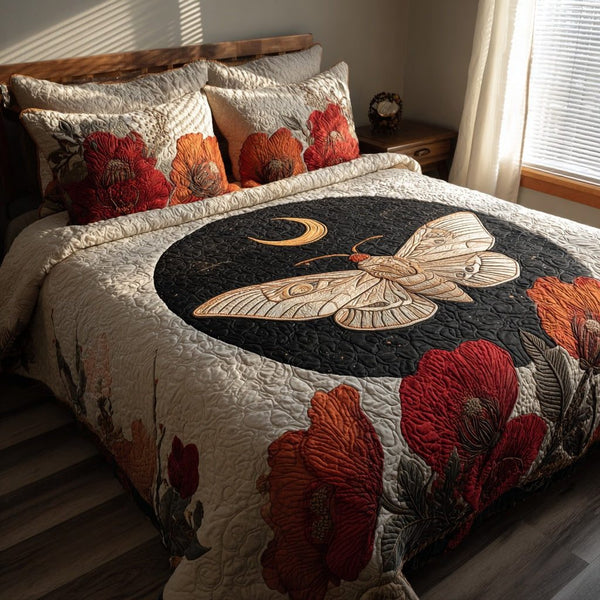 Poppy Moth quilted 3-piece bedding set on a made bed with two matching pillow shams