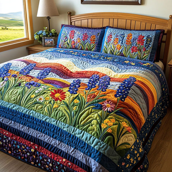 Prairie in Bloom quilted 3-piece bedding set on a made bed in a rustic timber bedroom