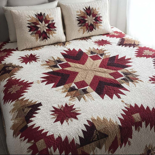 Prairie Starfield quilted 3-piece bedding set on a made bed in a rustic timber bedroom