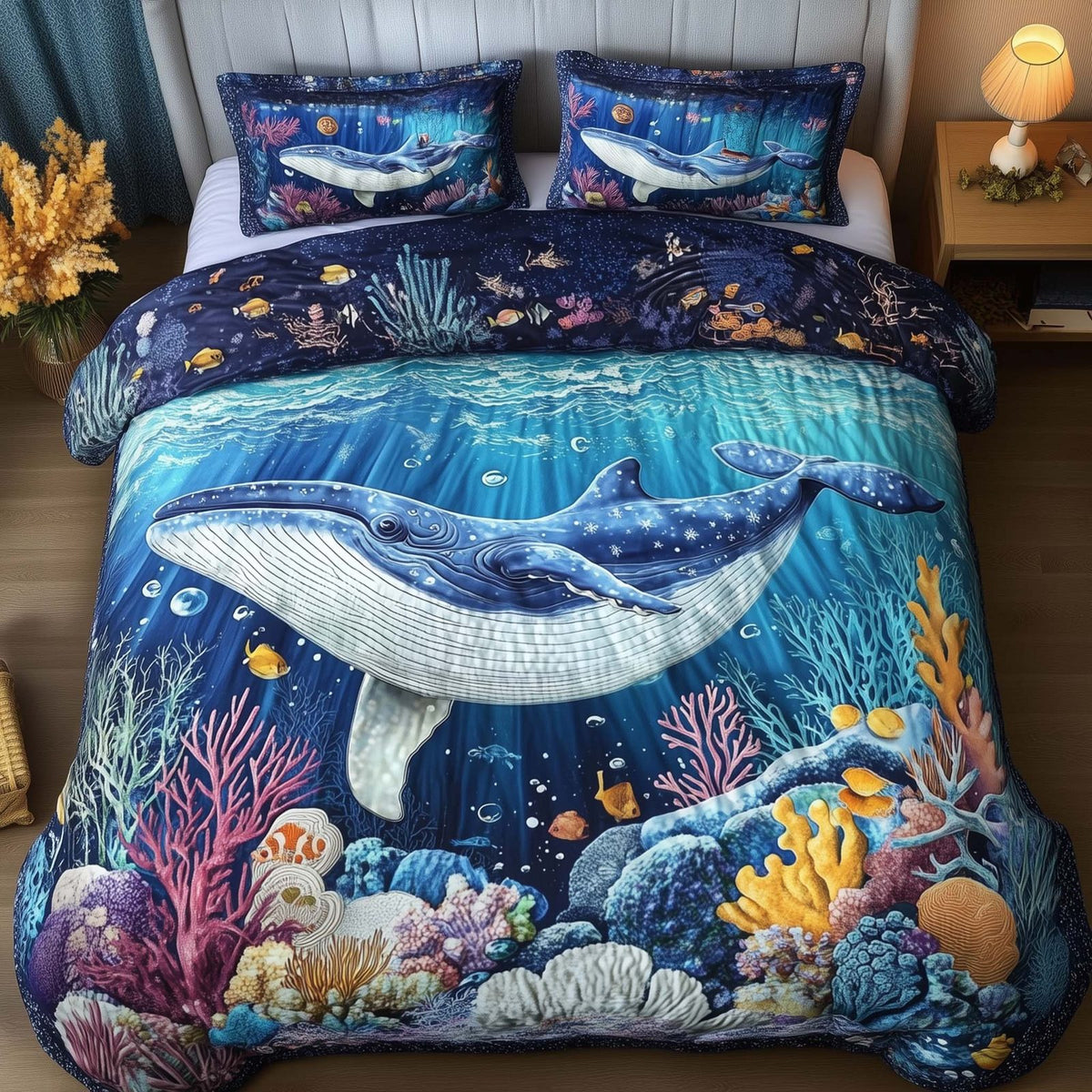 Prism Whale quilted 3-piece bedding set on a made bed in a light coastal bedroom