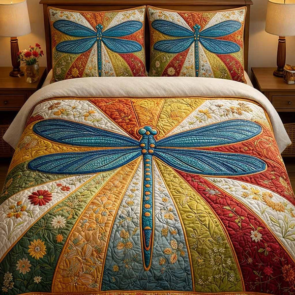 Prism Wings quilted 3-piece bedding set on a made bed with two matching pillow shams