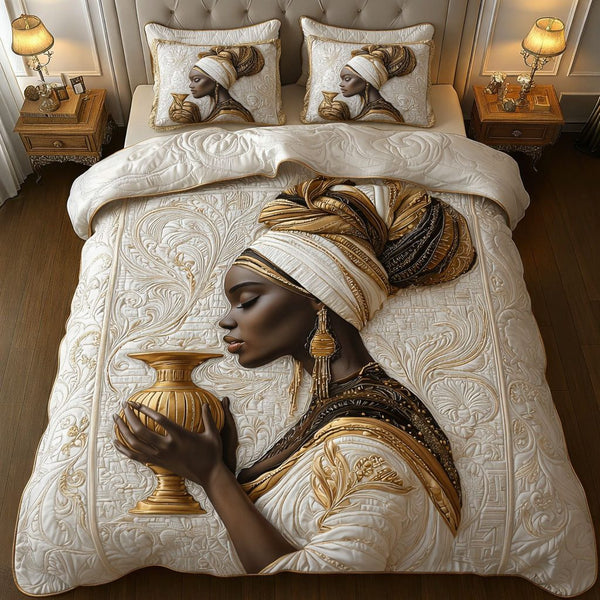 Proud Roots quilted 3-piece bedding set on a made bed with two matching pillow shams