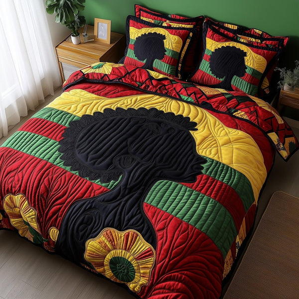 Proud Roots quilted 3-piece bedding set on a made bed with two matching pillow shams
