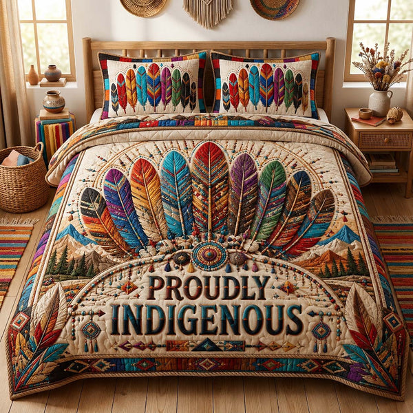 Proudly Indigenous Pride quilted 3-piece bedding set on a made bed with two matching pillow shams