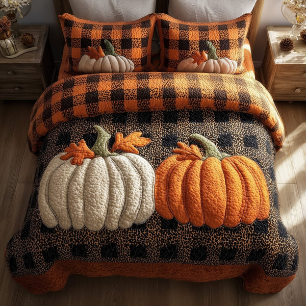 Pumpkin Charm quilted 3-piece bedding set on a made bed against a dark styled interior